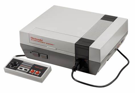 A Nintendo Entertainment System with an original controller.