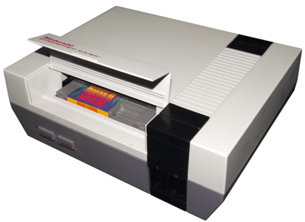 Nintendo Entertainment System with a “Dragon Warrior” game cartridge inside.